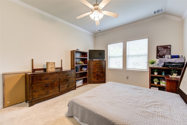 carpeted bedroom with ceiling fan, lofted ceiling, and ornamental molding