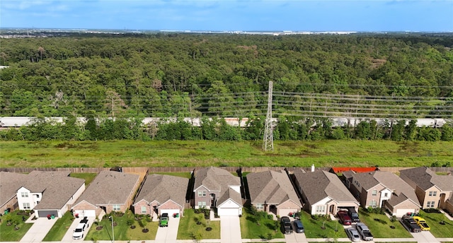 8438 Sunset Isles Dr, Baytown, TX 77521 - aerial view of residential area with a heavily wooded area