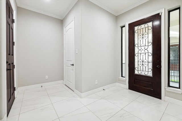 entryway featuring crown molding