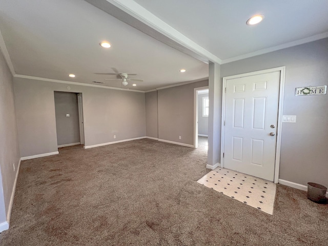 carpeted entryway featuring recessed lighting, baseboards, and ornamental molding