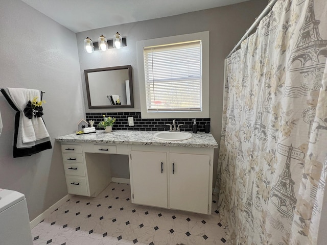 full bathroom featuring decorative backsplash, vanity, and baseboards