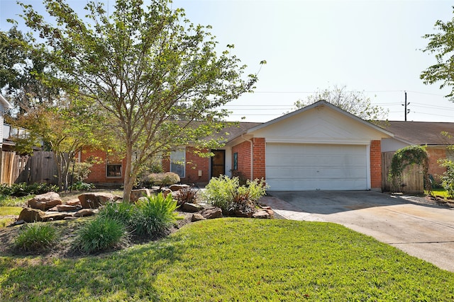 single story home featuring a garage and a front lawn