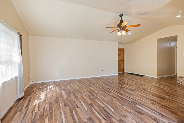 unfurnished room featuring hardwood / wood-style floors, ceiling fan, and lofted ceiling