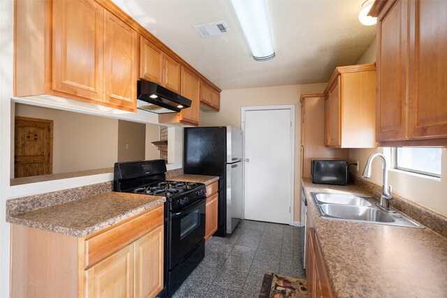 kitchen with sink and black appliances