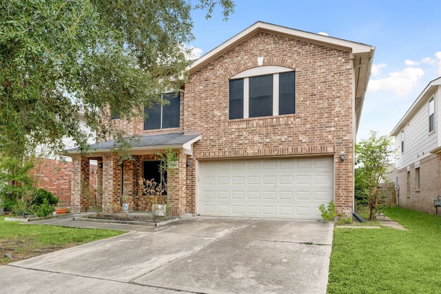 front of property featuring a garage and a front yard