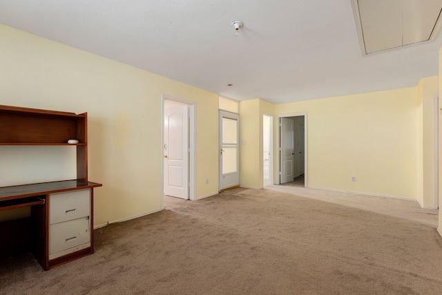 interior space featuring light carpet