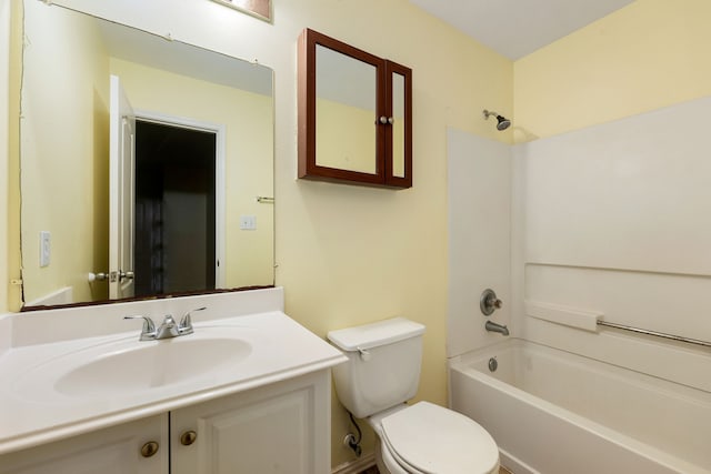 full bathroom featuring vanity, toilet, and  shower combination