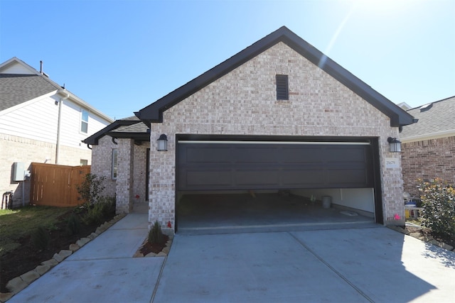 exterior space with fence and driveway