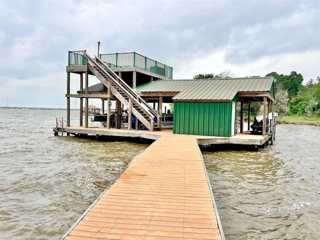 dock area with a water view