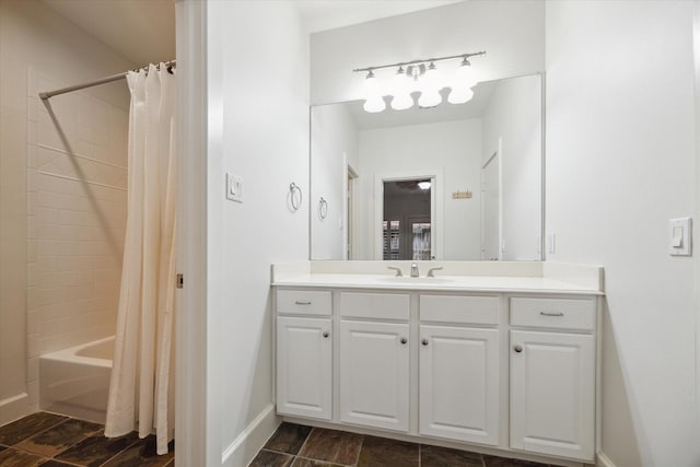 bathroom featuring shower / tub combo with curtain and vanity