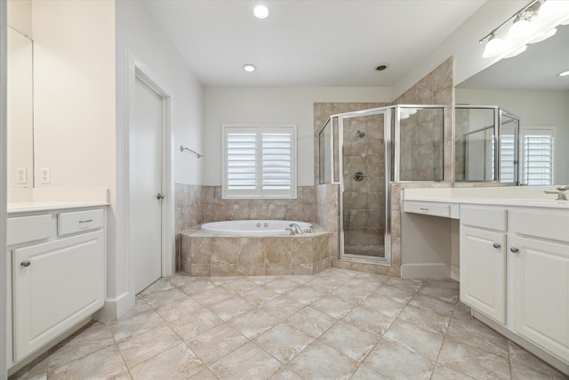 bathroom featuring independent shower and bath and vanity