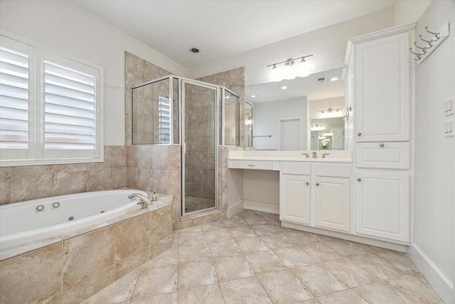 bathroom featuring separate shower and tub and vanity