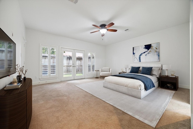 bedroom featuring ceiling fan, french doors, access to outside, and light carpet