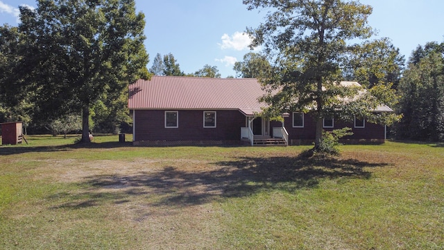 ranch-style house featuring a front yard