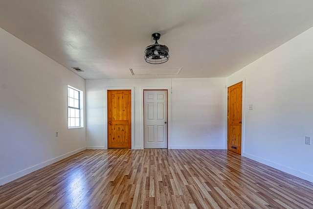 unfurnished bedroom with light hardwood / wood-style floors