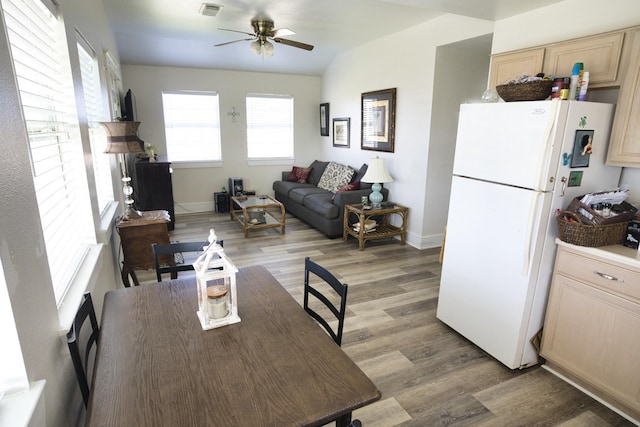 334 Sand Dune Ct, Surfside Beach, TX 77541 - dining area featuring light wood-style floors, ceiling fan, and baseboards
