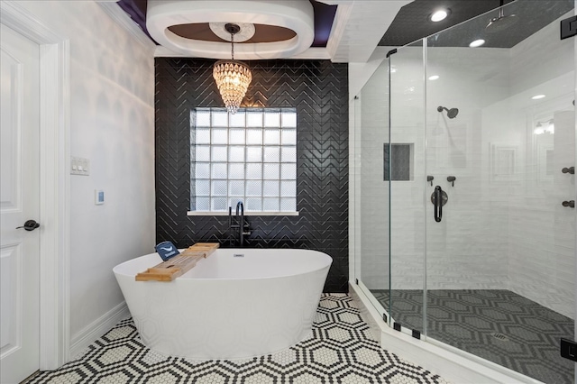 bathroom with crown molding, tile patterned flooring, and independent shower and bath