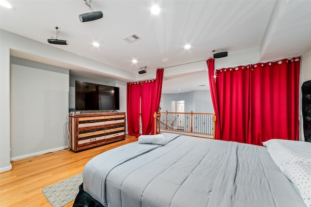 bedroom featuring hardwood / wood-style floors