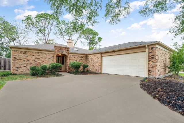 ranch-style home with a garage