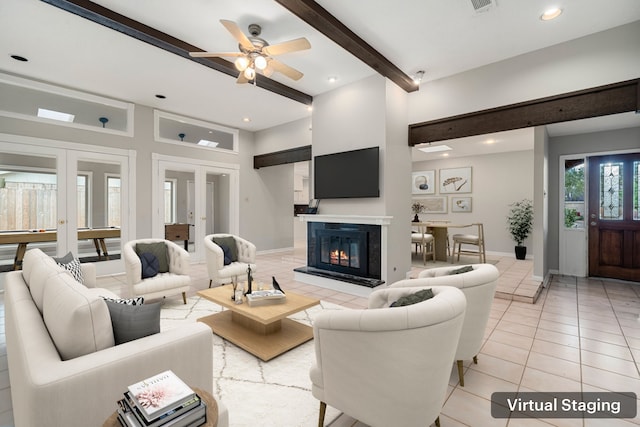 living room with french doors, baseboards, beam ceiling, and light tile patterned floors