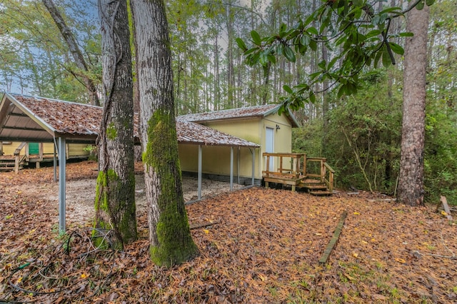 view of yard featuring a wooden deck