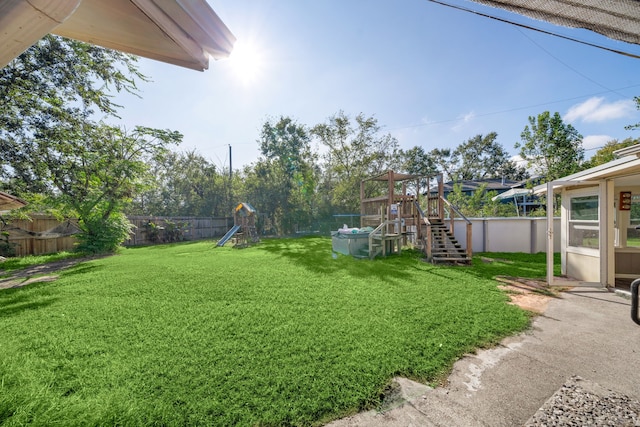 view of yard featuring a playground