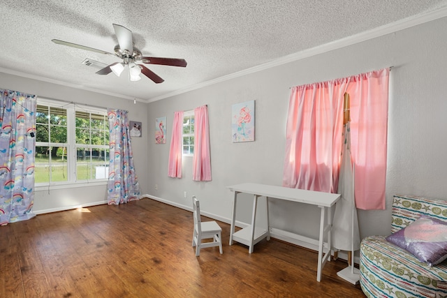 misc room with ornamental molding, dark hardwood / wood-style flooring, a textured ceiling, and ceiling fan