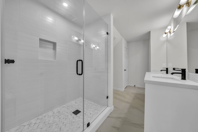 bathroom with vanity and walk in shower