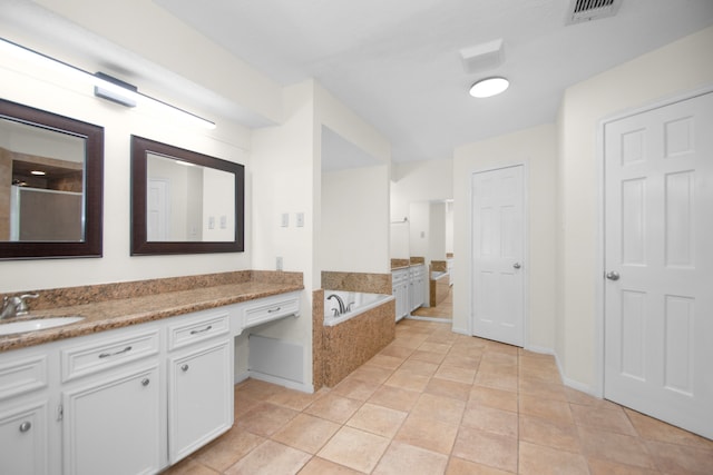 bathroom featuring vanity, tile patterned floors, and independent shower and bath