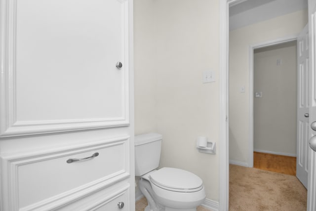 bathroom featuring toilet