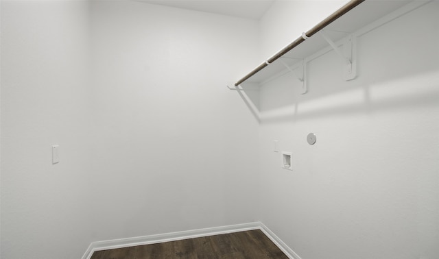 laundry room featuring hardwood / wood-style flooring and hookup for a washing machine