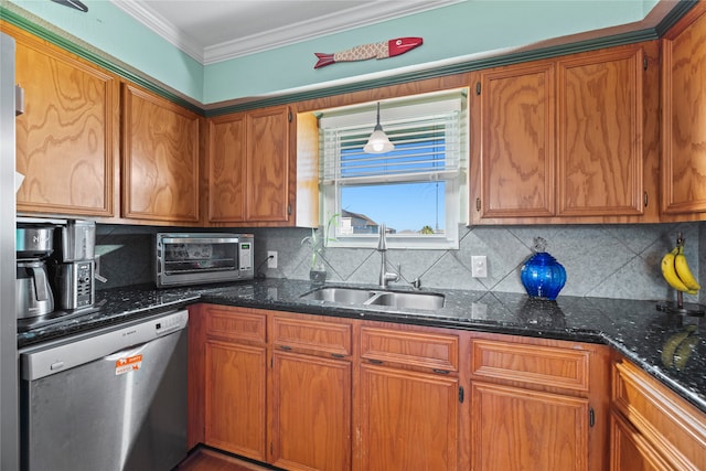 kitchen with dishwasher, sink, tasteful backsplash, dark stone countertops, and crown molding