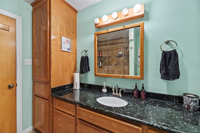 bathroom featuring vanity and walk in shower