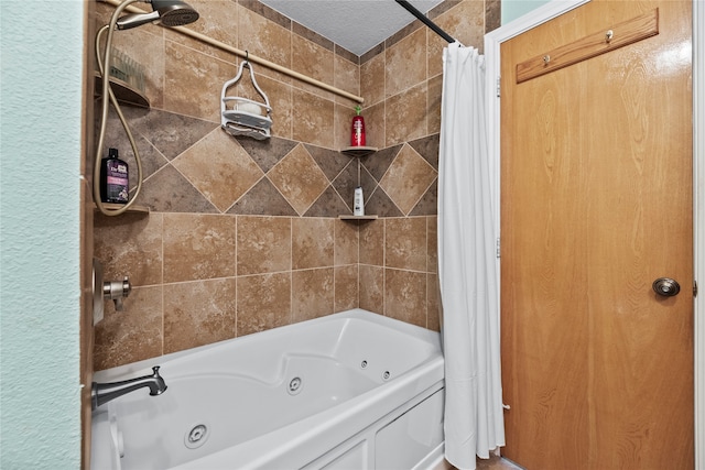 bathroom with a textured ceiling and shower / bathtub combination with curtain