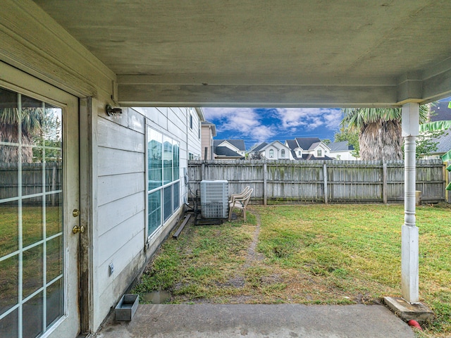 view of yard featuring central AC unit