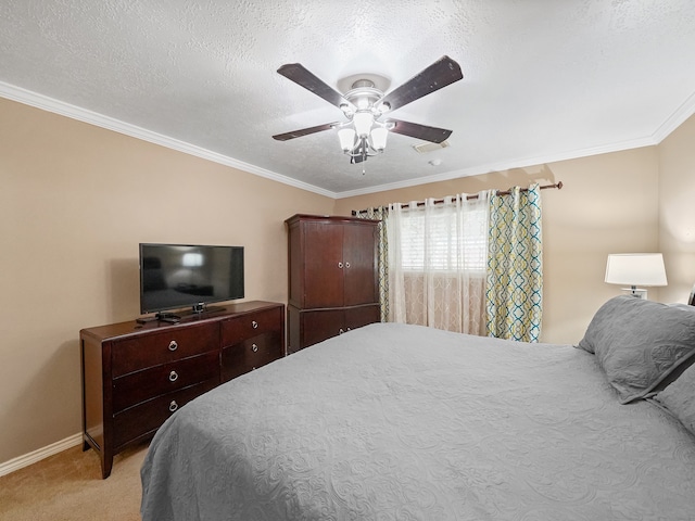 carpeted bedroom featuring a textured ceiling, ceiling fan, and crown molding