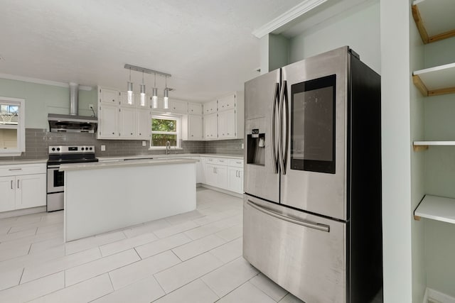 kitchen featuring a kitchen island, white cabinets, and appliances with stainless steel finishes