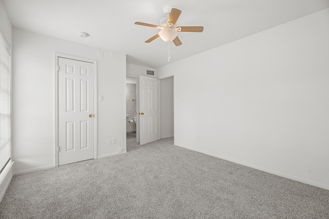 unfurnished bedroom featuring carpet floors and ceiling fan