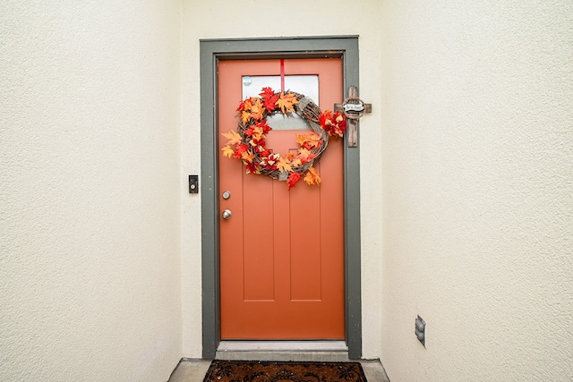 property entrance featuring elevator