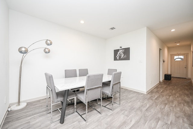 dining room featuring light hardwood / wood-style floors