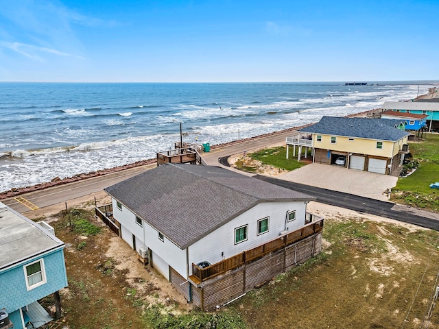 aerial view featuring a view of the beach and a water view