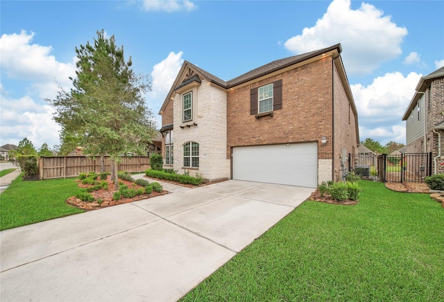 view of property with a front lawn and a garage