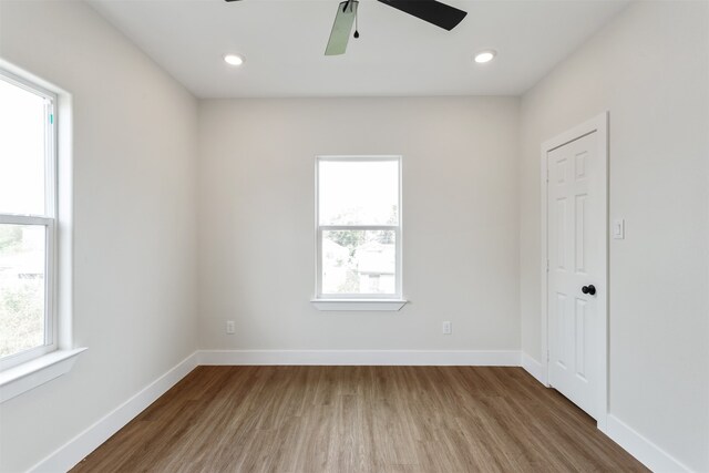 unfurnished room featuring wood-type flooring and ceiling fan