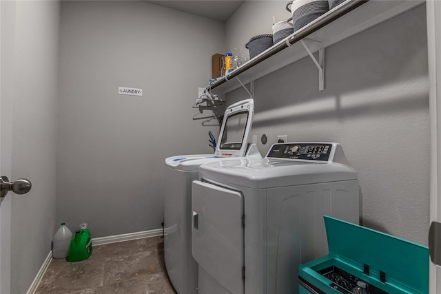 laundry room featuring washer and clothes dryer