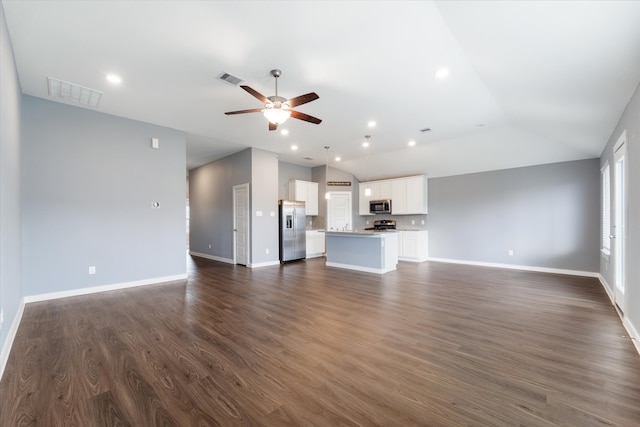 unfurnished living room featuring lofted ceiling, ceiling fan, and dark hardwood / wood-style flooring