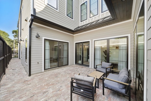 wooden deck with a patio