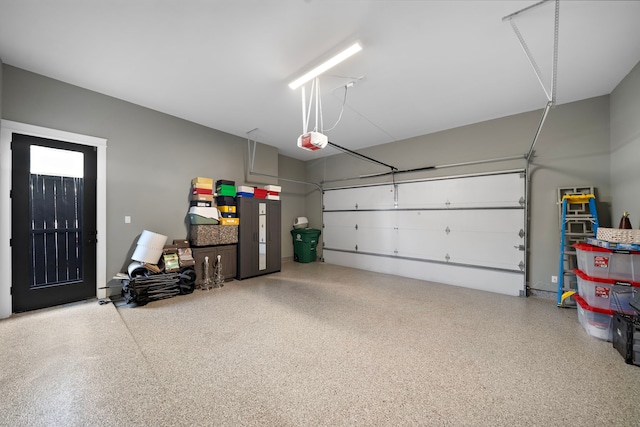 garage featuring a garage door opener