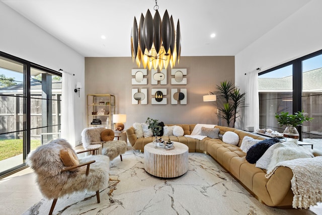 living room featuring an inviting chandelier