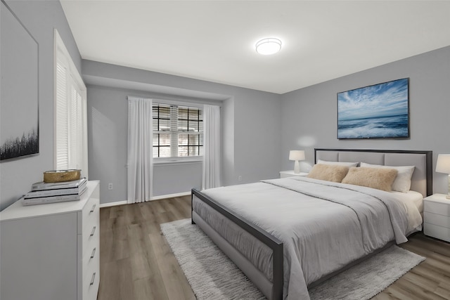 bedroom with light hardwood / wood-style floors