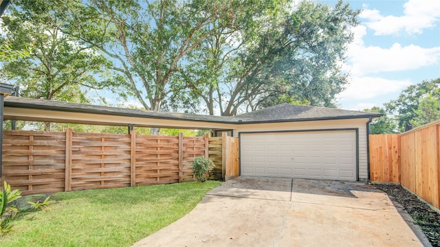 garage with a yard